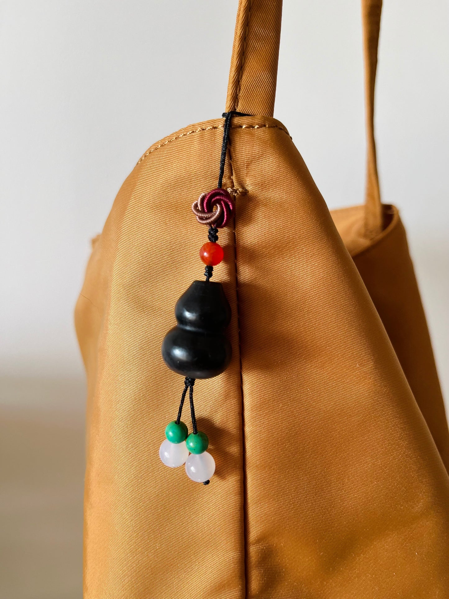 Handmade Phone Charm / Bag Charm with a Carved Black Hetian Jade Hulu