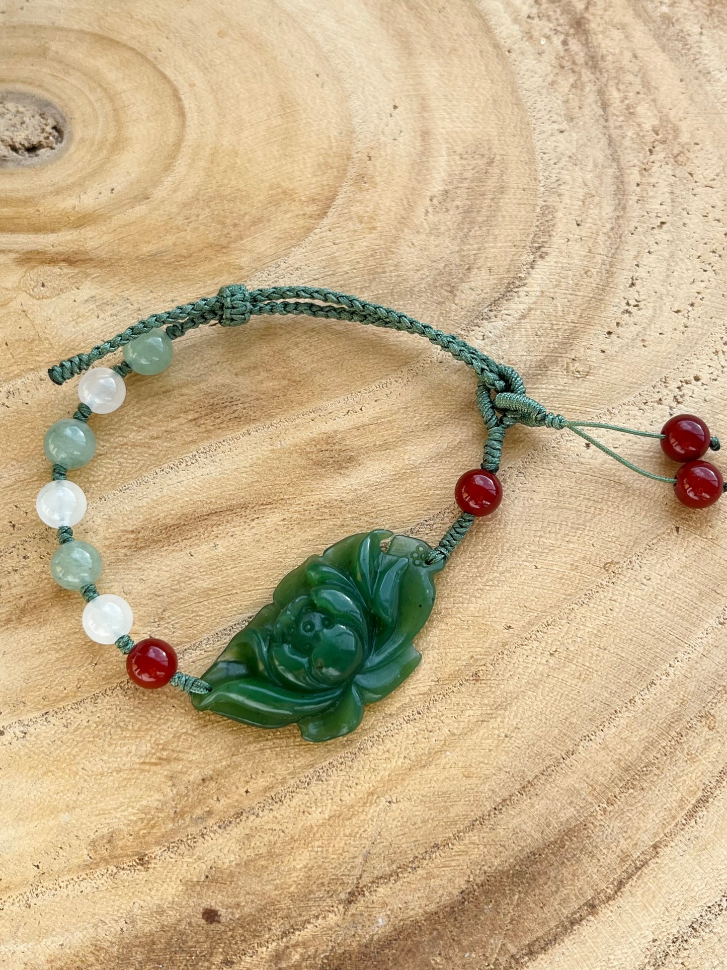 Handwoven Bracelet with a Hand Carved Green Hetian Jade Lotus Flower, 手编和田碧玉莲花手牌