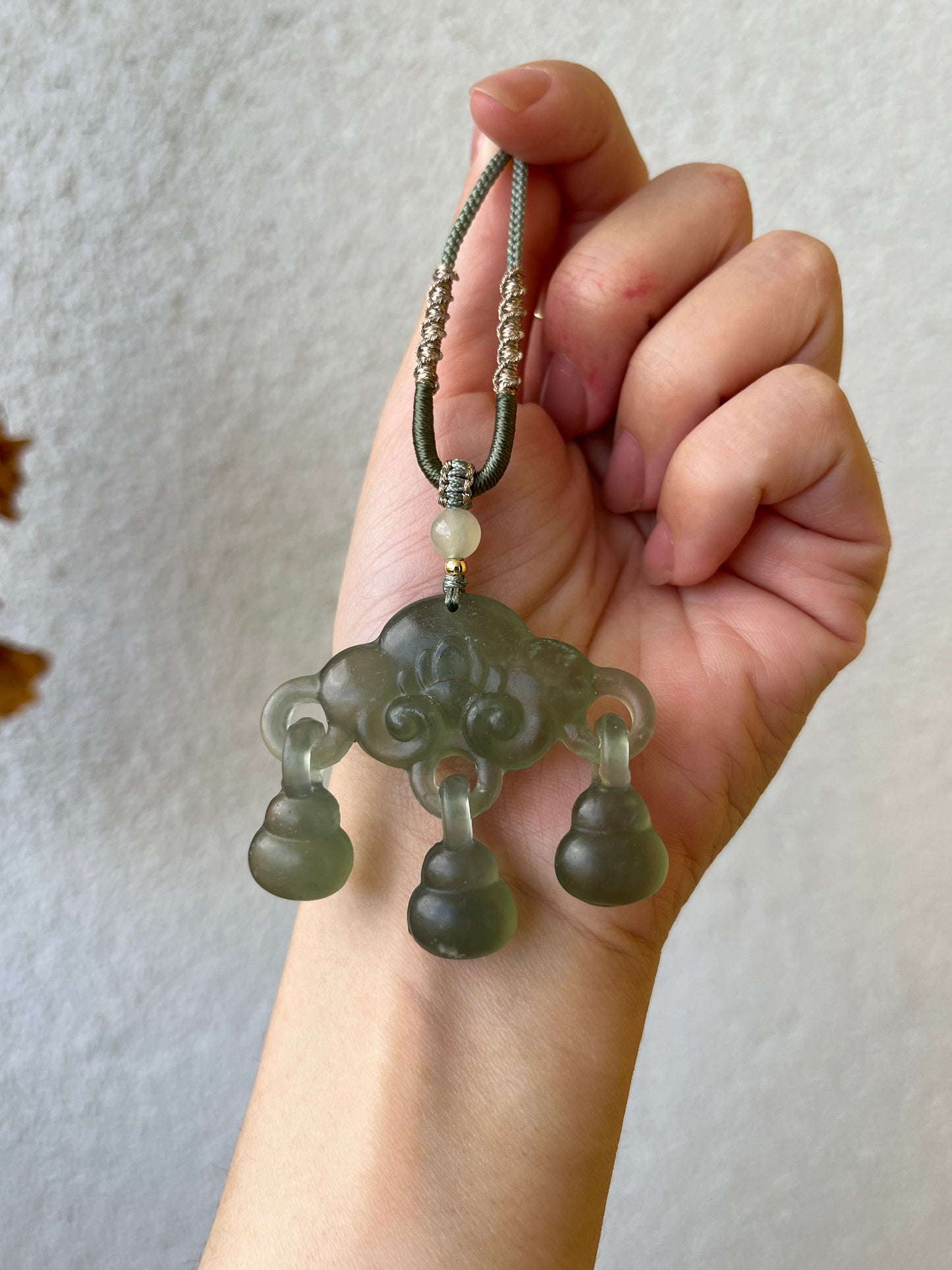 Icy Green Xiu Jade Auspicious Cloud Ruyi Lock
