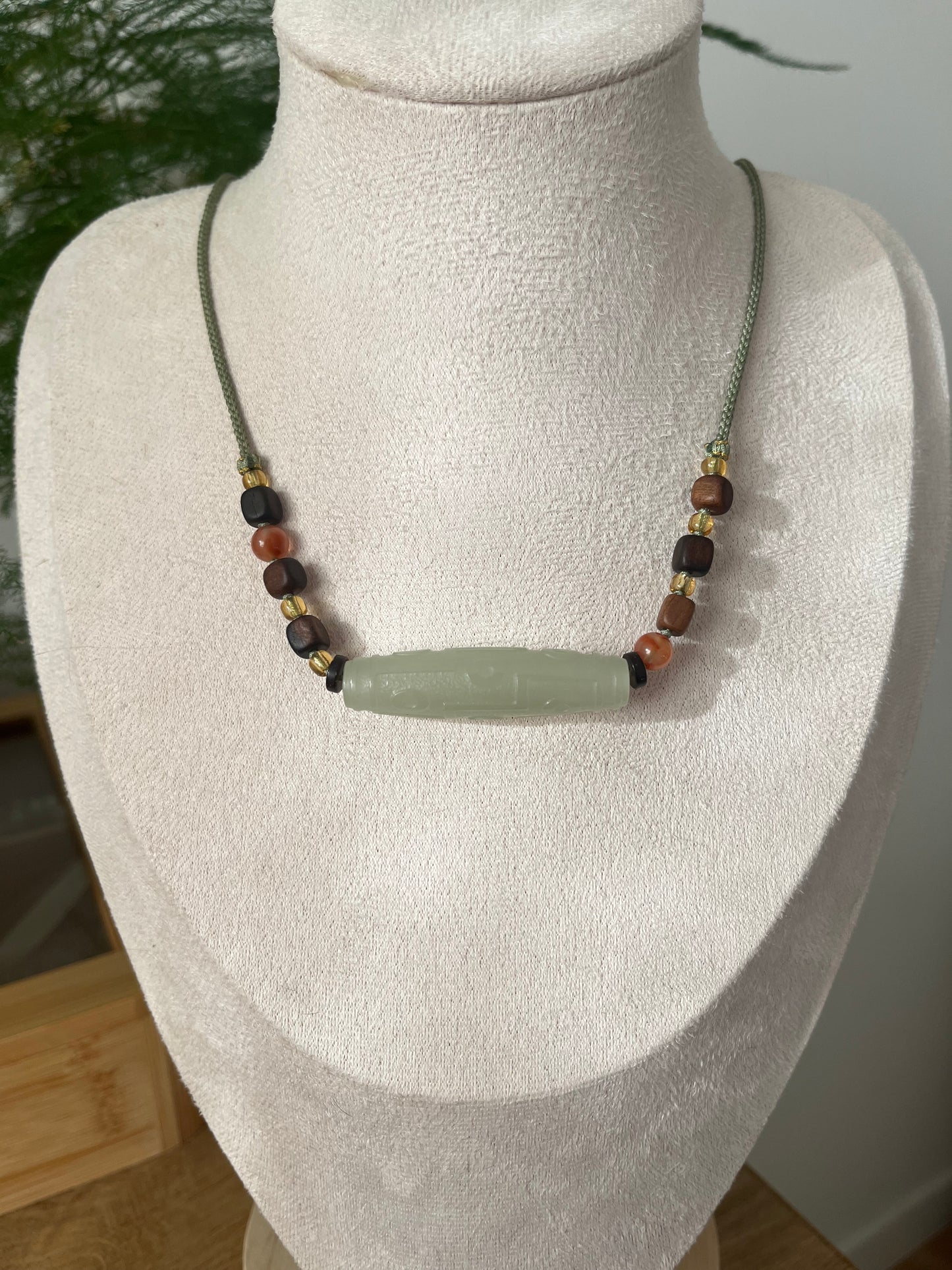 Necklace Crafted from a Hetian Jade Nine-Eyed Dzi Bead | 和田晴水九眼天珠