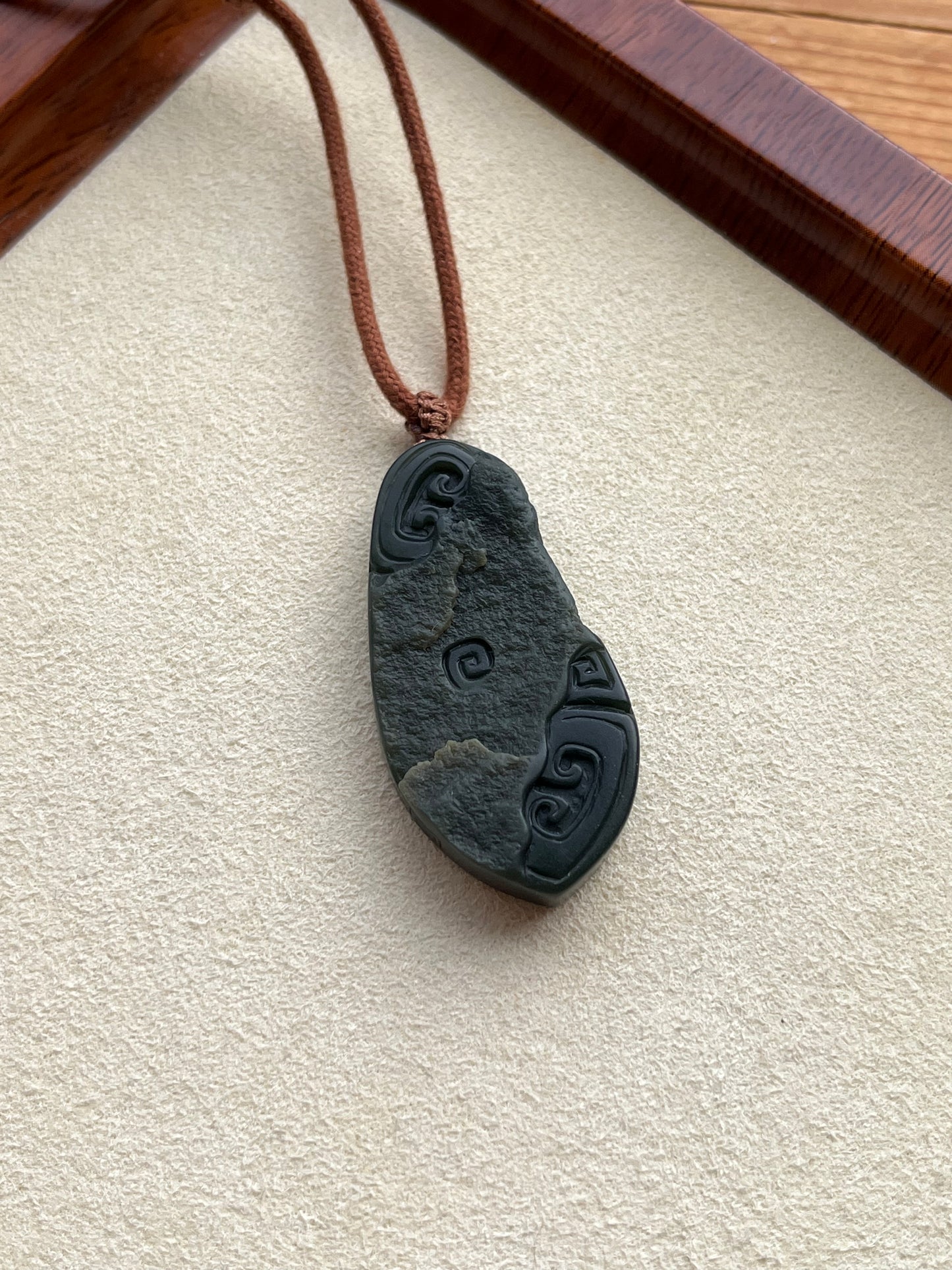 Hand Carved Ancient Style Dark Green Hetian Jade Pendant | 手雕青玉一细带皮仿古牌