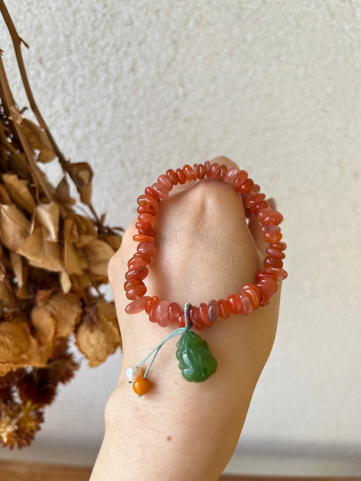 Irregular Shaped Nanhong Agate Beaded Bracelet with A Green Hetian Jade Pixiu