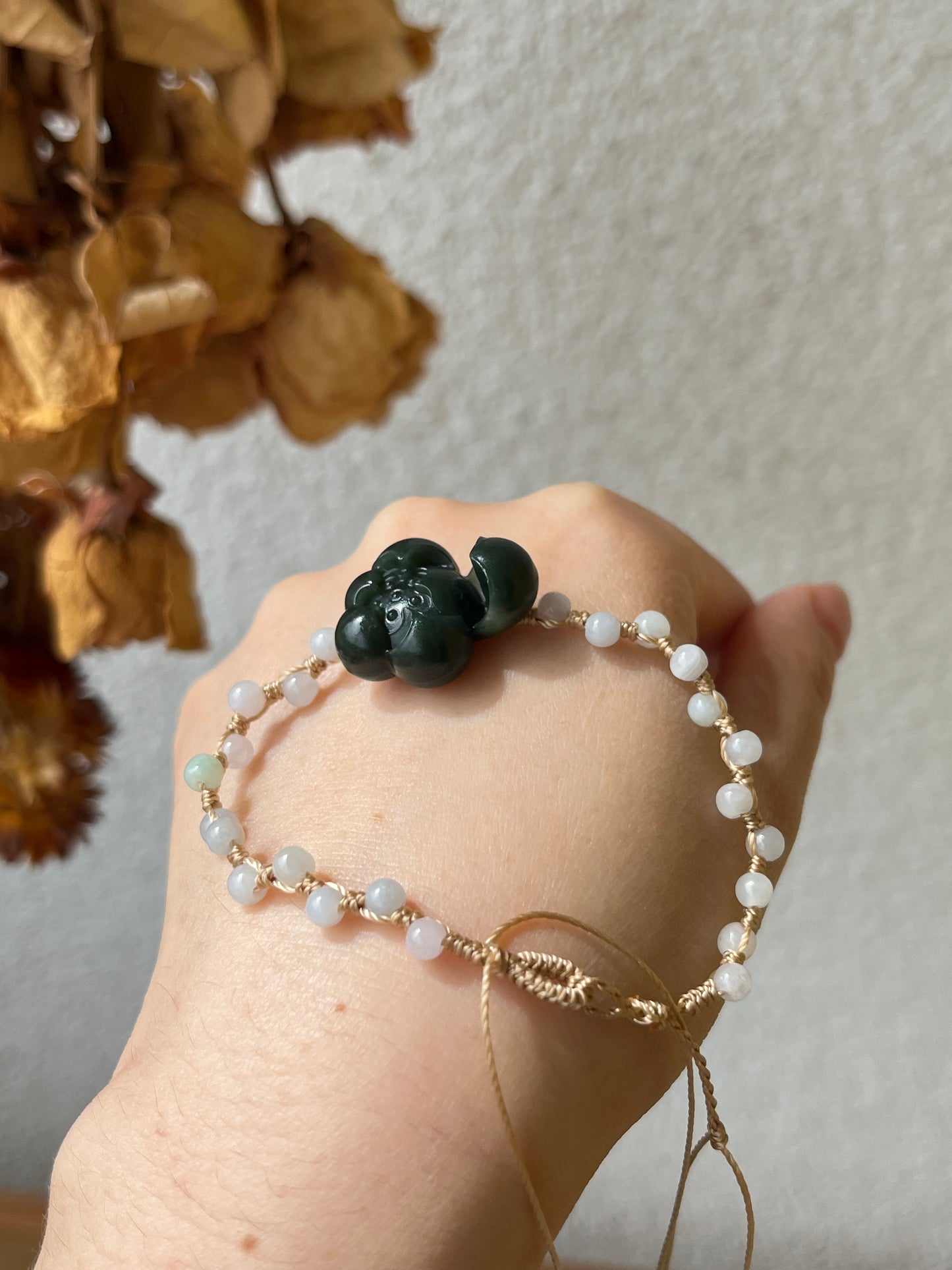 Handmade Bracelet with a Dark Cyan Hetian Jade Lotus | 手编和田青玉一细小荷花手牌