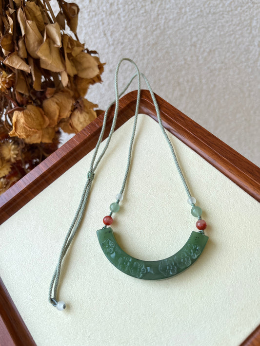 Hand Carved Green Hetian Jade Plum Blossom Arc-shaped Huang Pendant | 手雕碧玉梅花玉璜