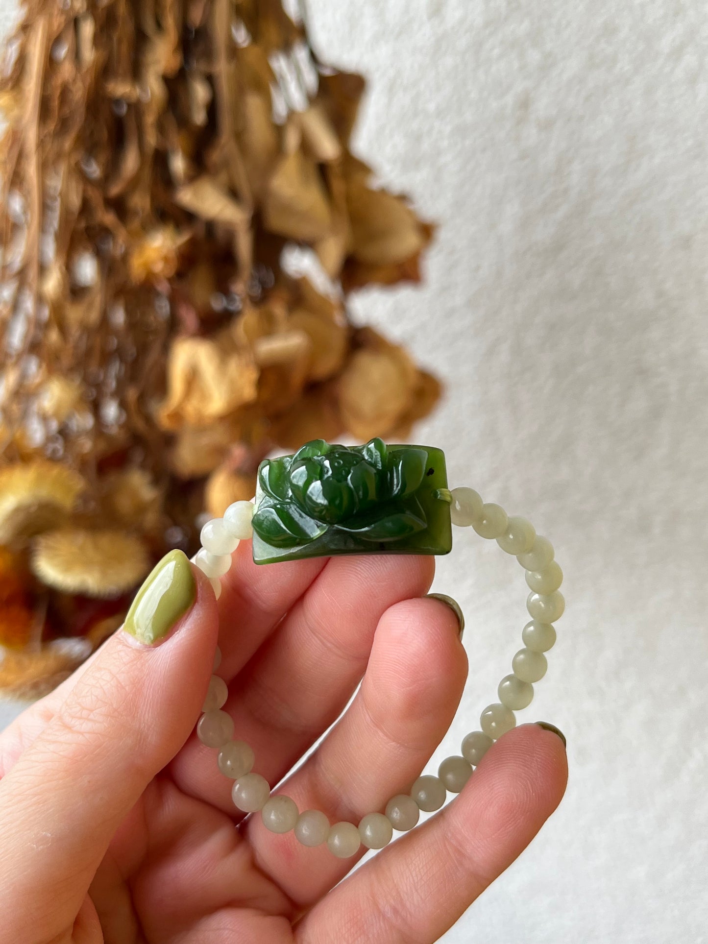 Bracelet Crafted from a Hand Carved Green Hetian Jade Lotus Pendant | 手雕碧玉小荷花手牌
