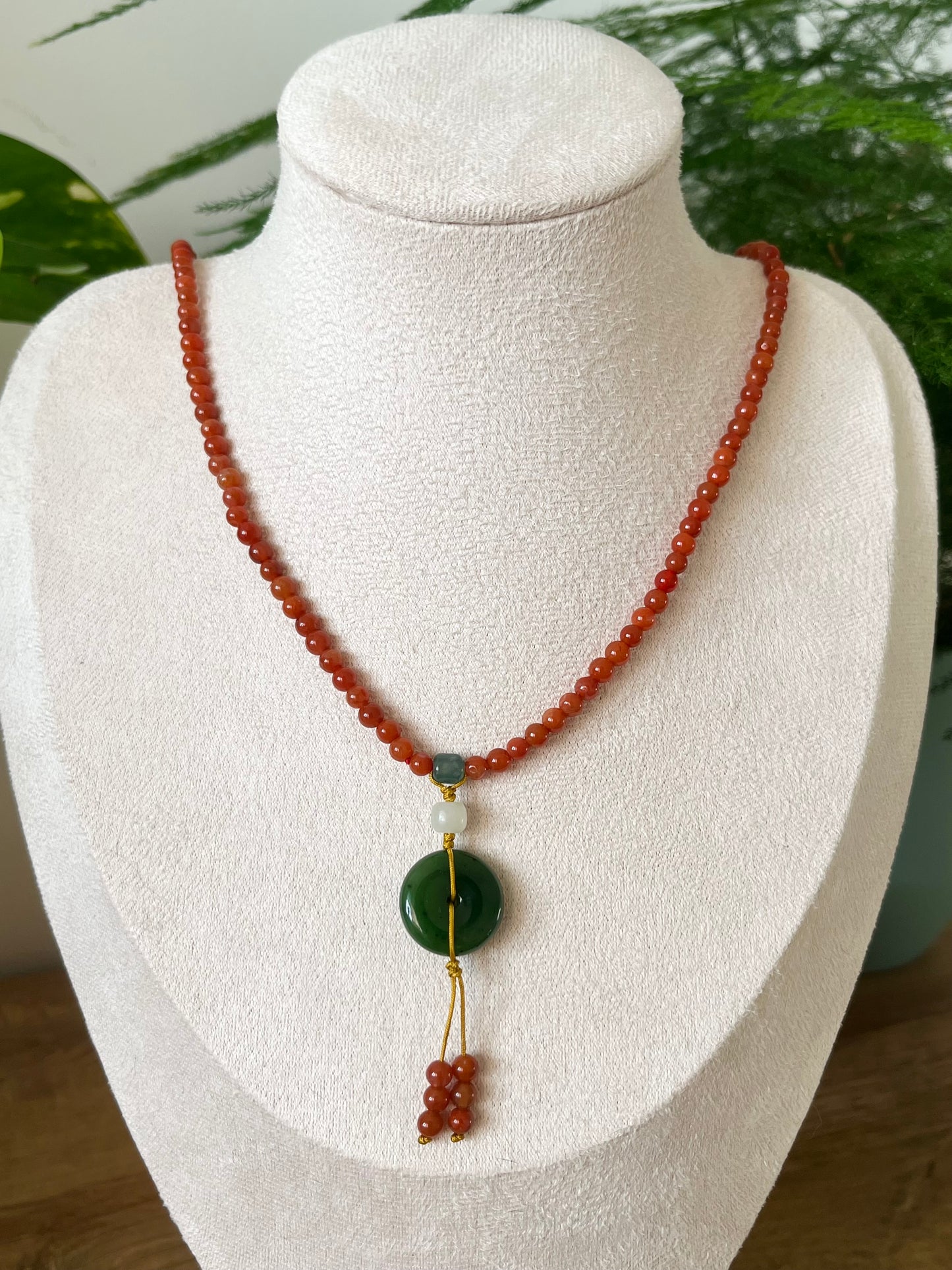 Multi-Function Three Loop Southern Red Agate Beaded Bracelet with a Green Hetian Jade PI pendant (ping an kou), 南红多圈手串加碧玉平安扣