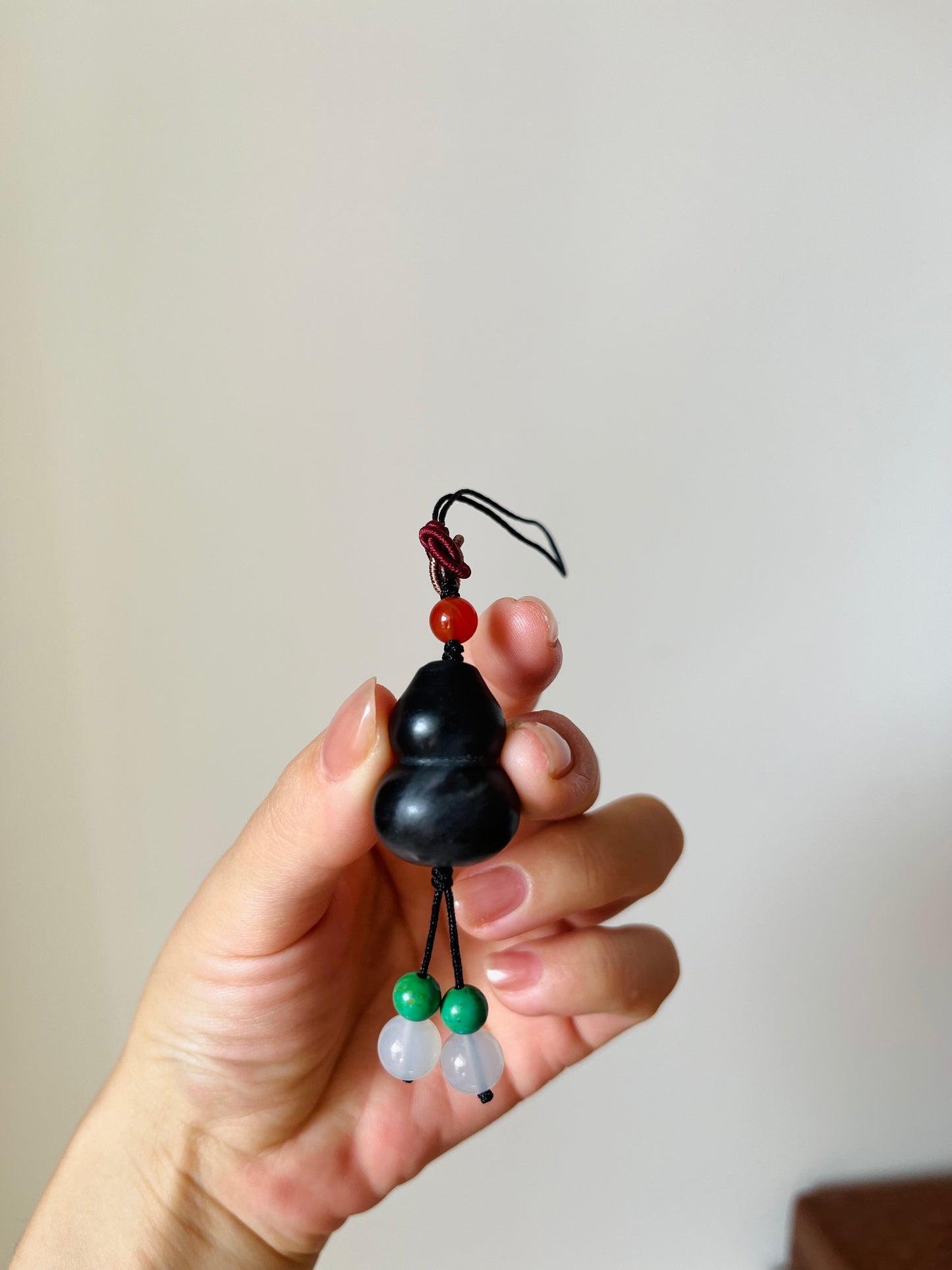 Handmade Phone Charm / Bag Charm with a Carved Black Hetian Jade Hulu