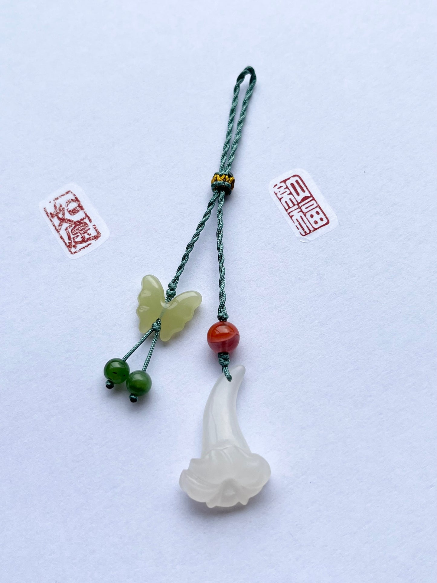 Handmade Phone Charm with a Hand Carved Hetian Jade Trumpet Flower and Butterfly
