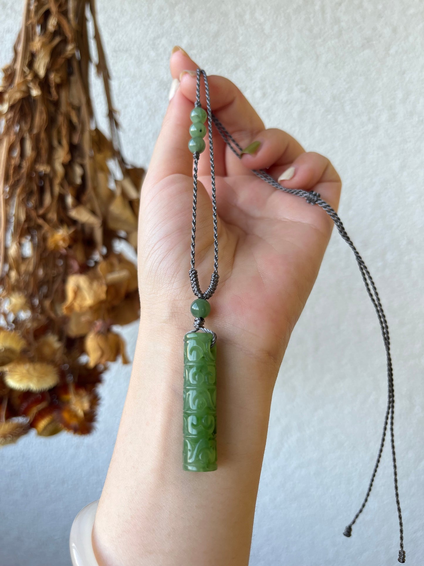 Cylindrical Green Hetian Jade Pendant Carved with Antique Pattern
