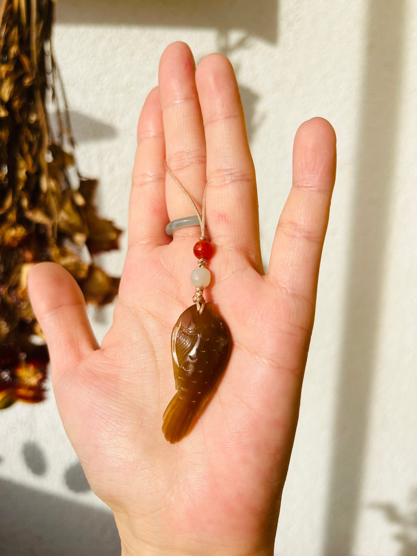 Hand Carved Brown Hetian Jade Fish Phone Charm