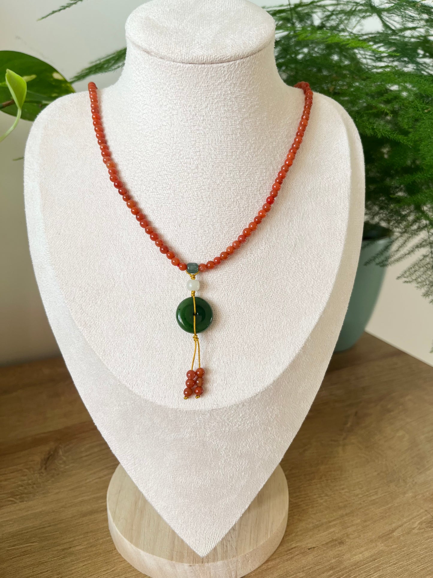 Multi-Function Three Loop Southern Red Agate Beaded Bracelet with a Green Hetian Jade PI pendant (ping an kou), 南红多圈手串加碧玉平安扣