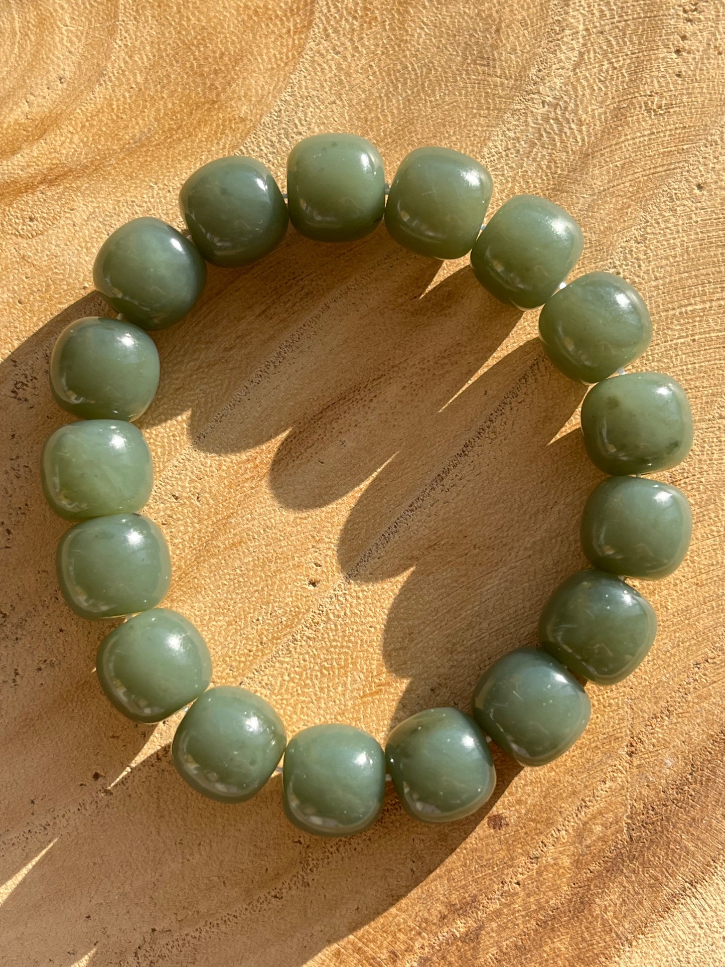 Blue Hetian Jade Bracelet with 12mm x 10mm Barrel Bead