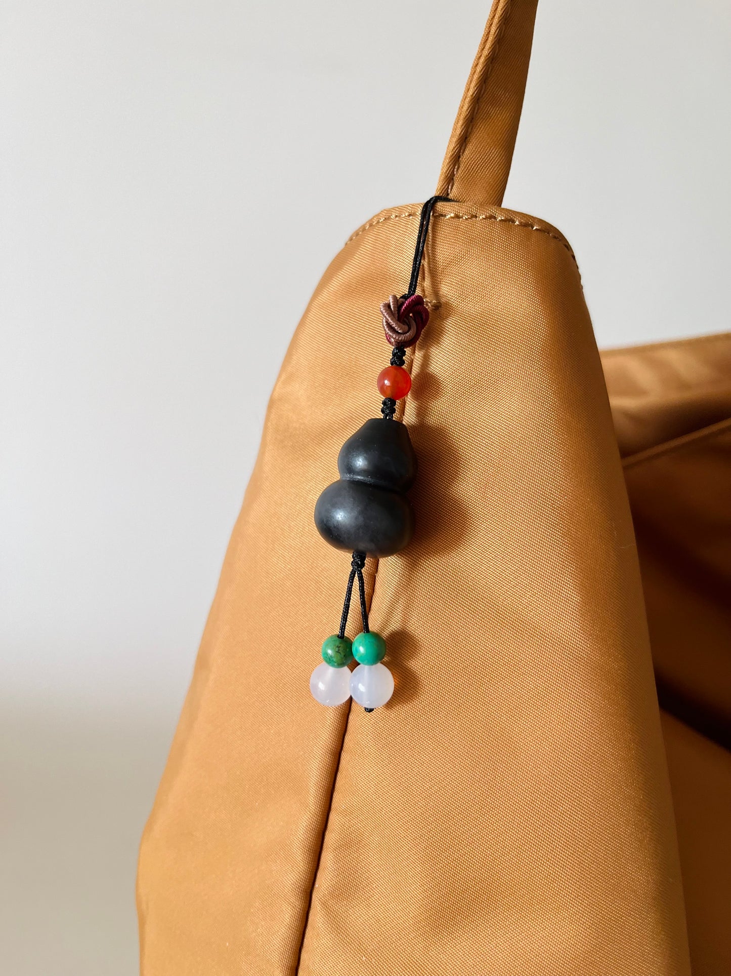 Handmade Phone Charm / Bag Charm with a Carved Black Hetian Jade Hulu
