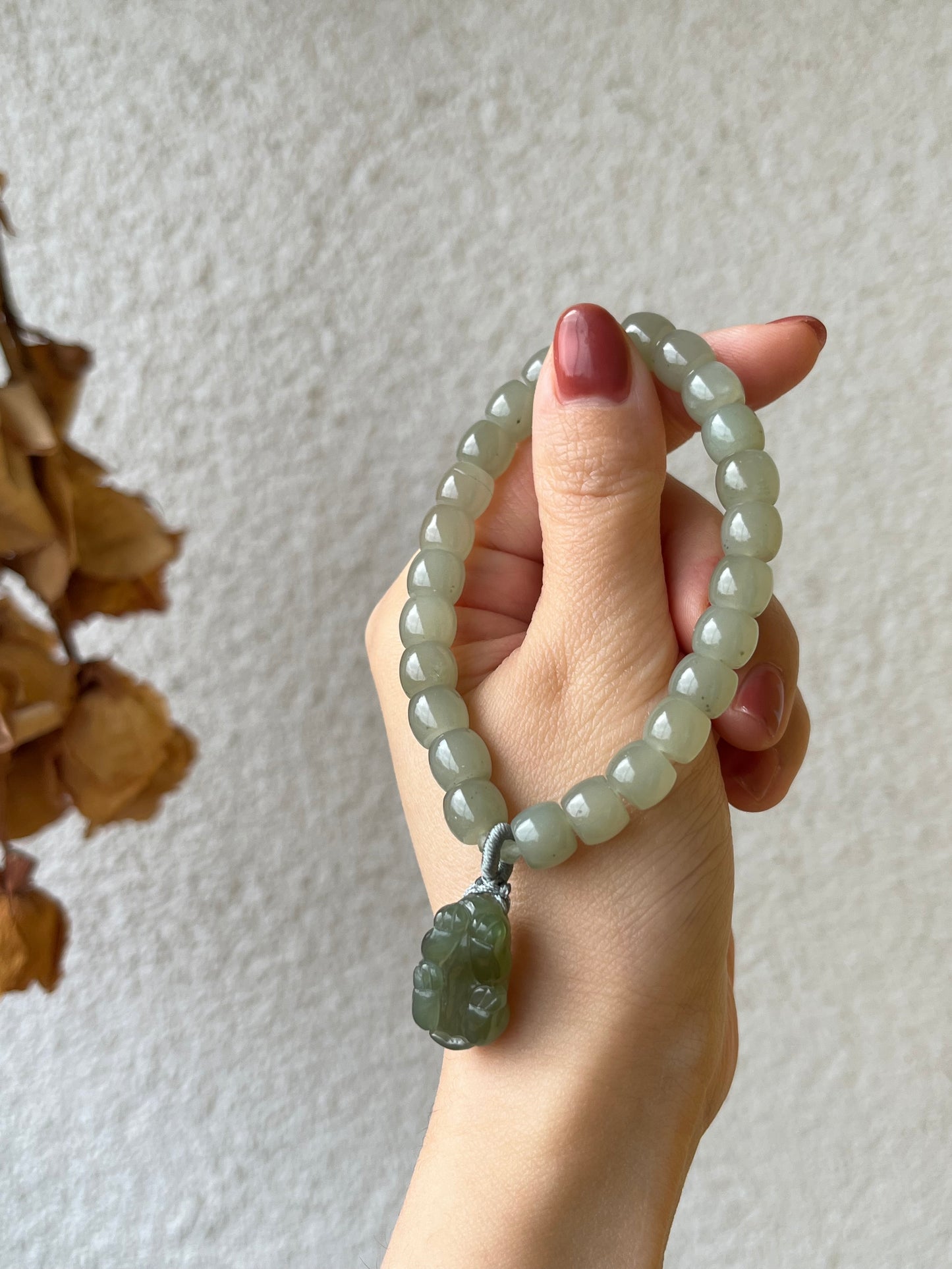 Straight Cut Hetian Jade Beaded (7mm x 8mm) Bracelet with a Hetian Jade Pixiu Pendant