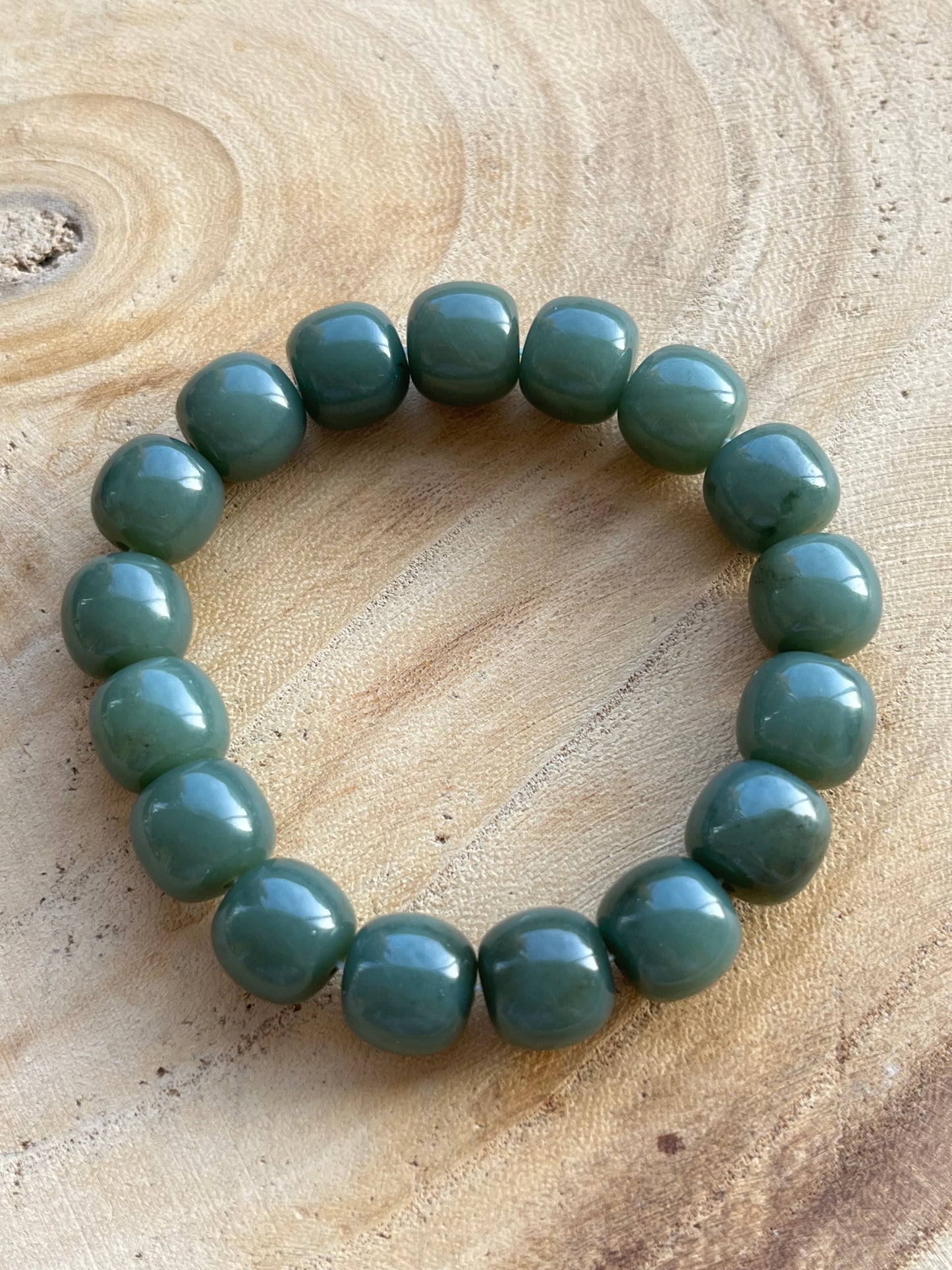 Blue Hetian Jade Bracelet with 12mm x 10mm Barrel Bead