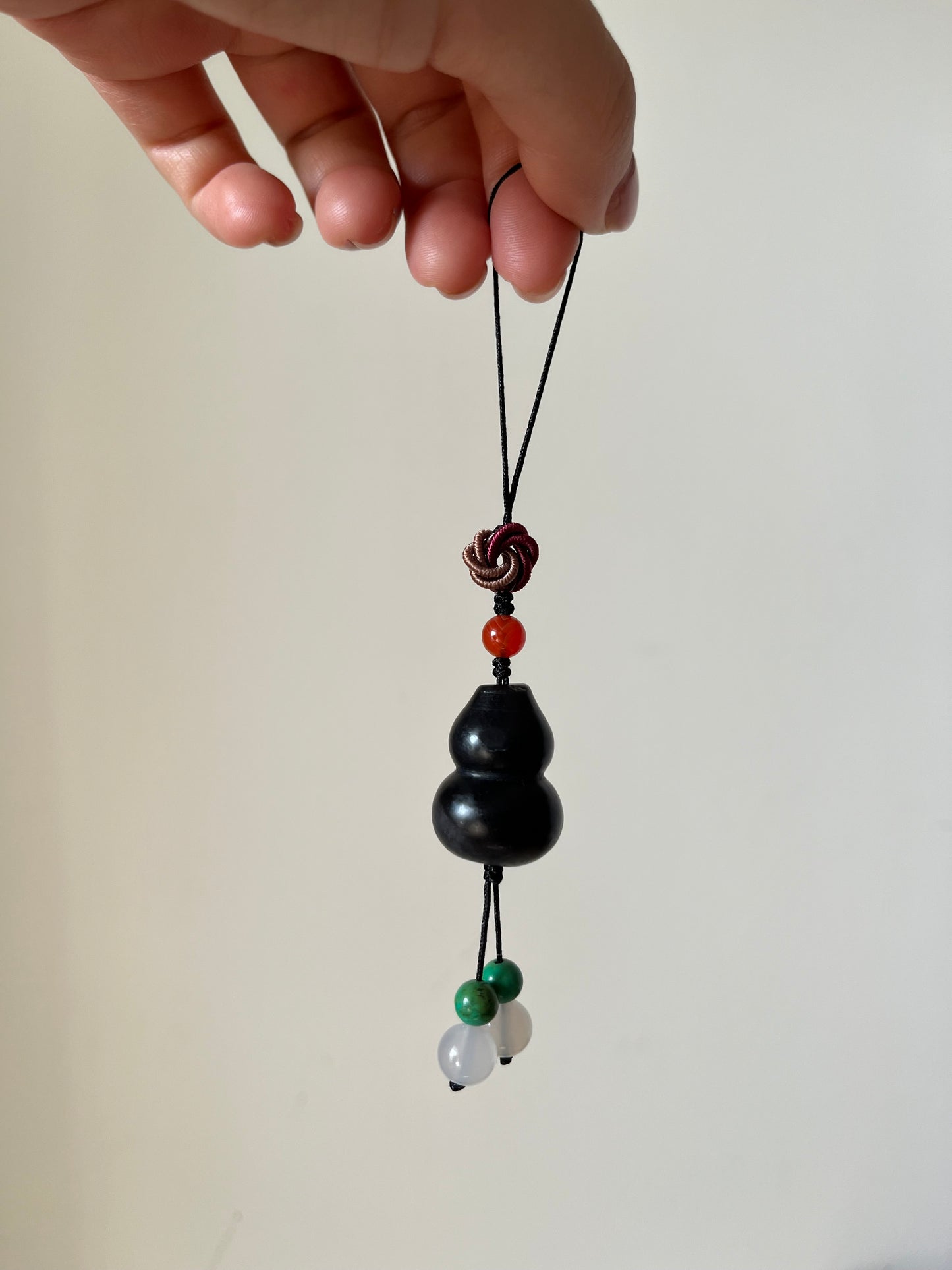 Handmade Phone Charm / Bag Charm with a Carved Black Hetian Jade Hulu