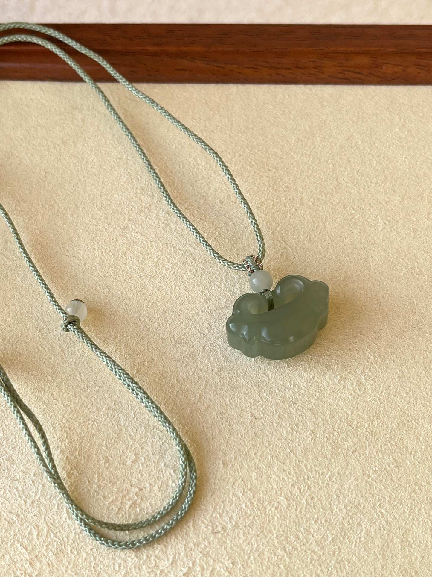 Hetian Jade Auspicious Cloud Ruyi Pendant | 和田晴水祥云如意锁