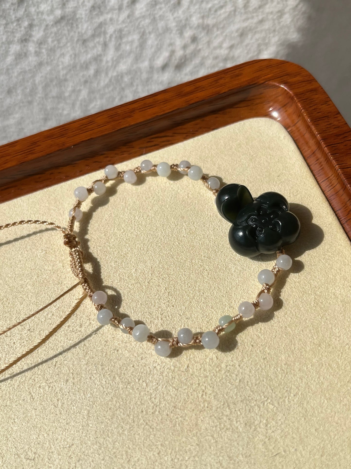 Handmade Bracelet with a Dark Cyan Hetian Jade Lotus | 手编和田青玉一细小荷花手牌