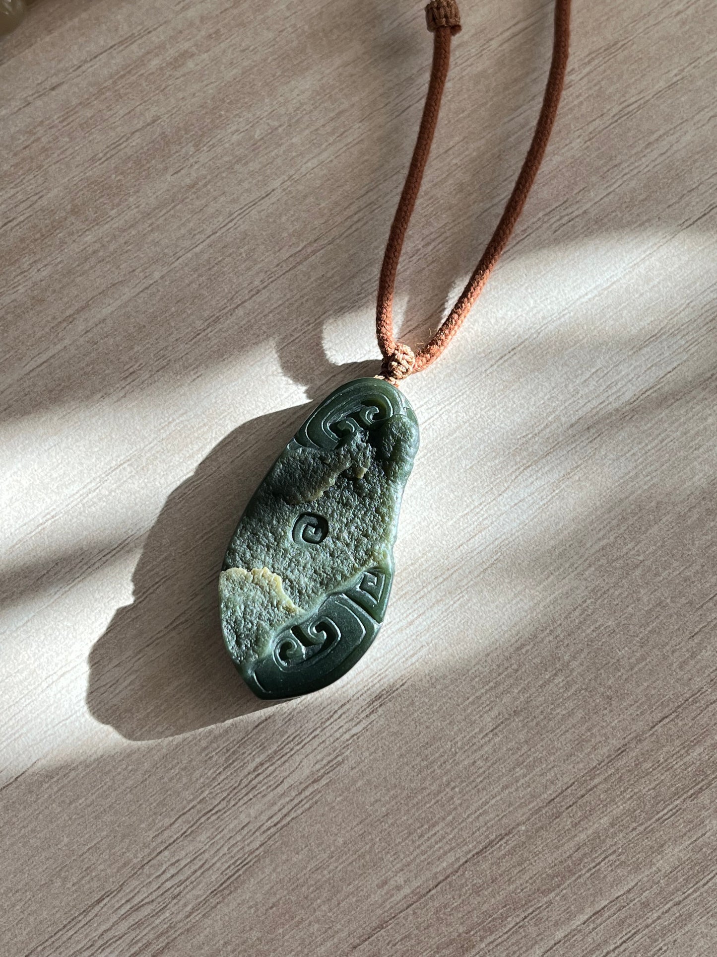 Hand Carved Ancient Style Dark Green Hetian Jade Pendant | 手雕青玉一细带皮仿古牌