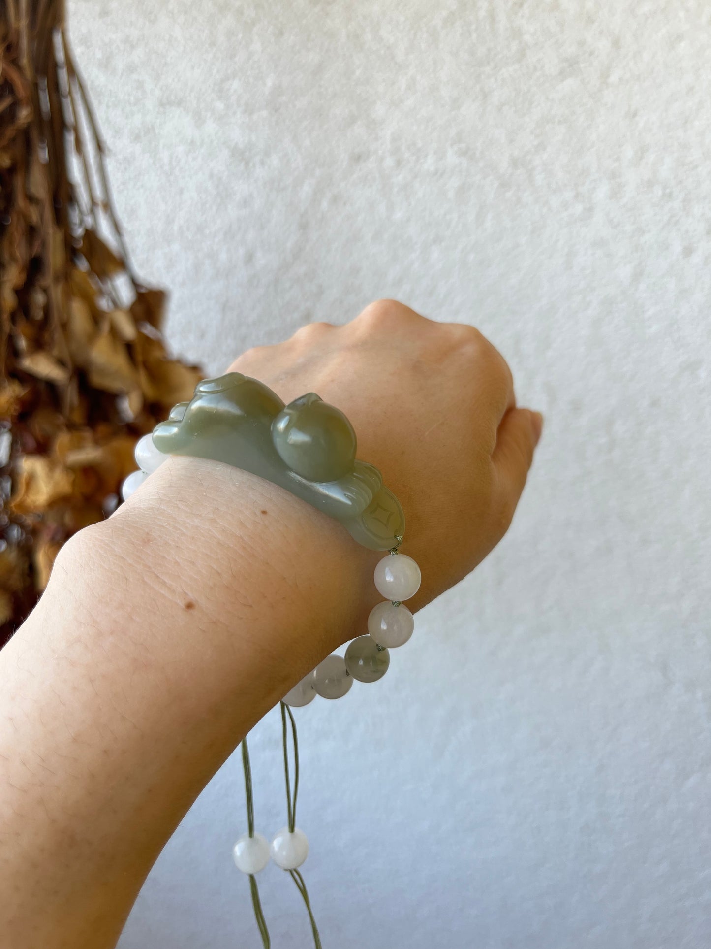Handwoven Bracelet with a Hand Carved Nephrite Jade Lucky Cat Pendant, 手编和田可爱趴趴招财猫手牌