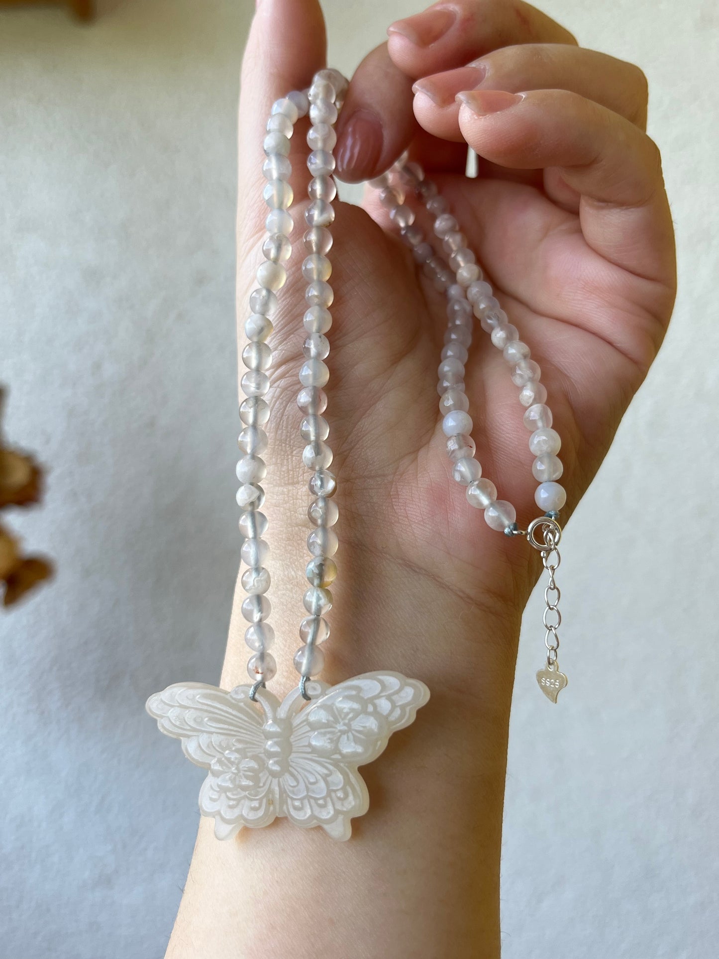 Handmade Necklace with Carved Hetian Jade Butterfly and 4mm Sakura Agate Beads