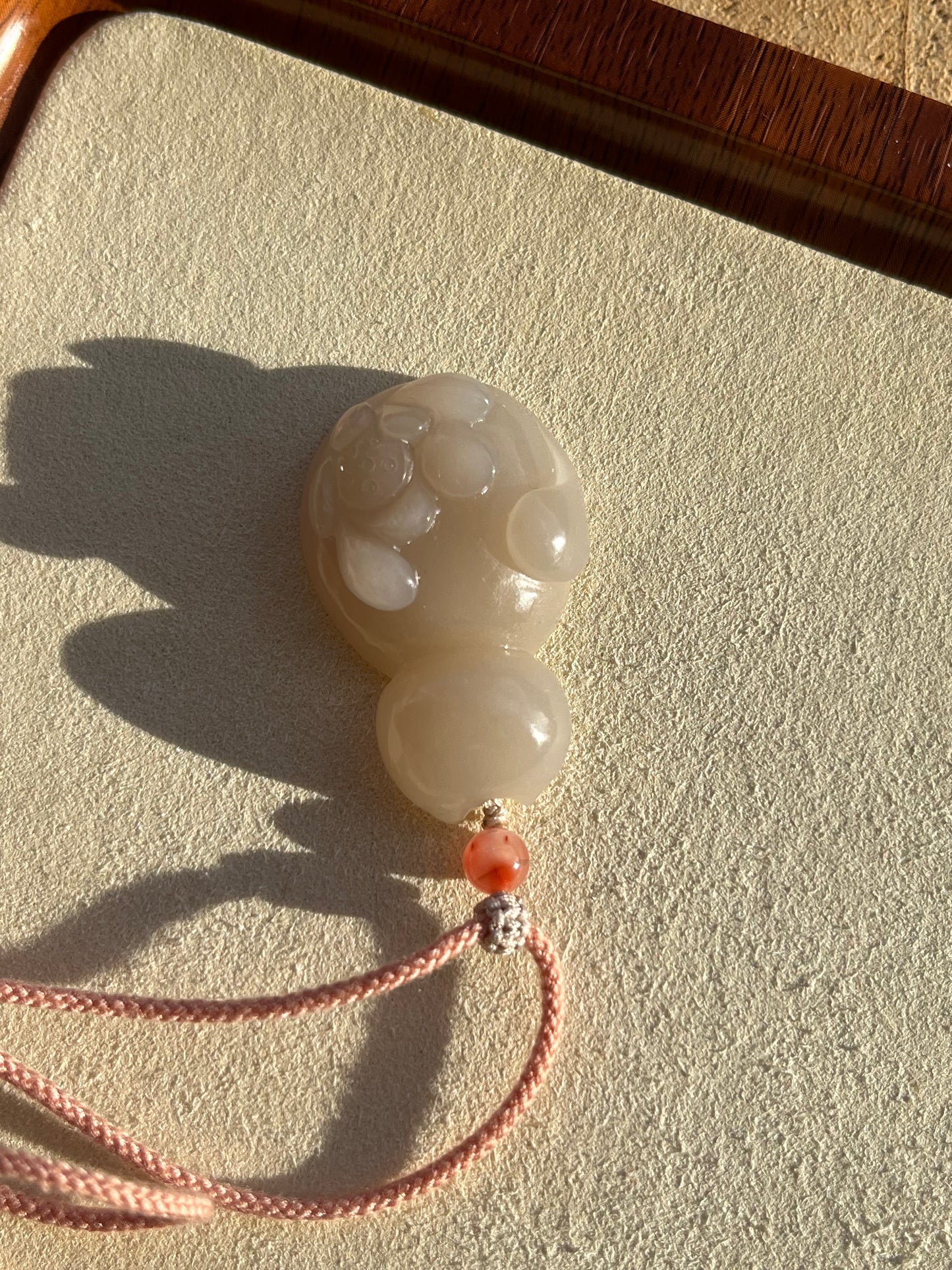 Hand Carved Dirty Pink Hetian Jade Lotus in a Cat Shape Pendant | 和田藕粉荷花猫