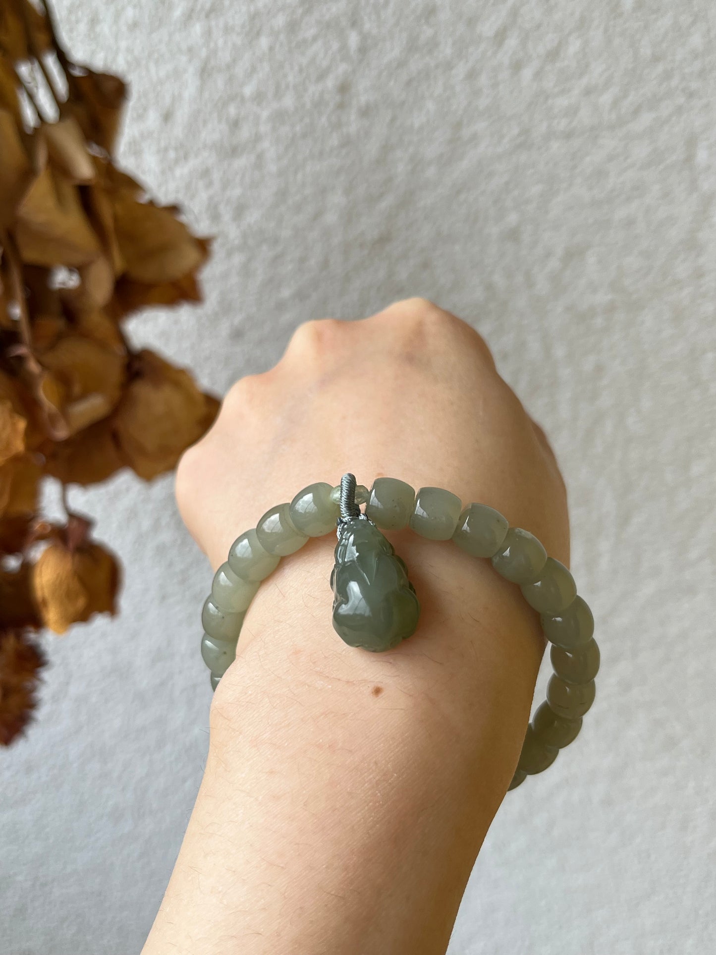 Straight Cut Hetian Jade Beaded (7mm x 8mm) Bracelet with a Hetian Jade Pixiu Pendant