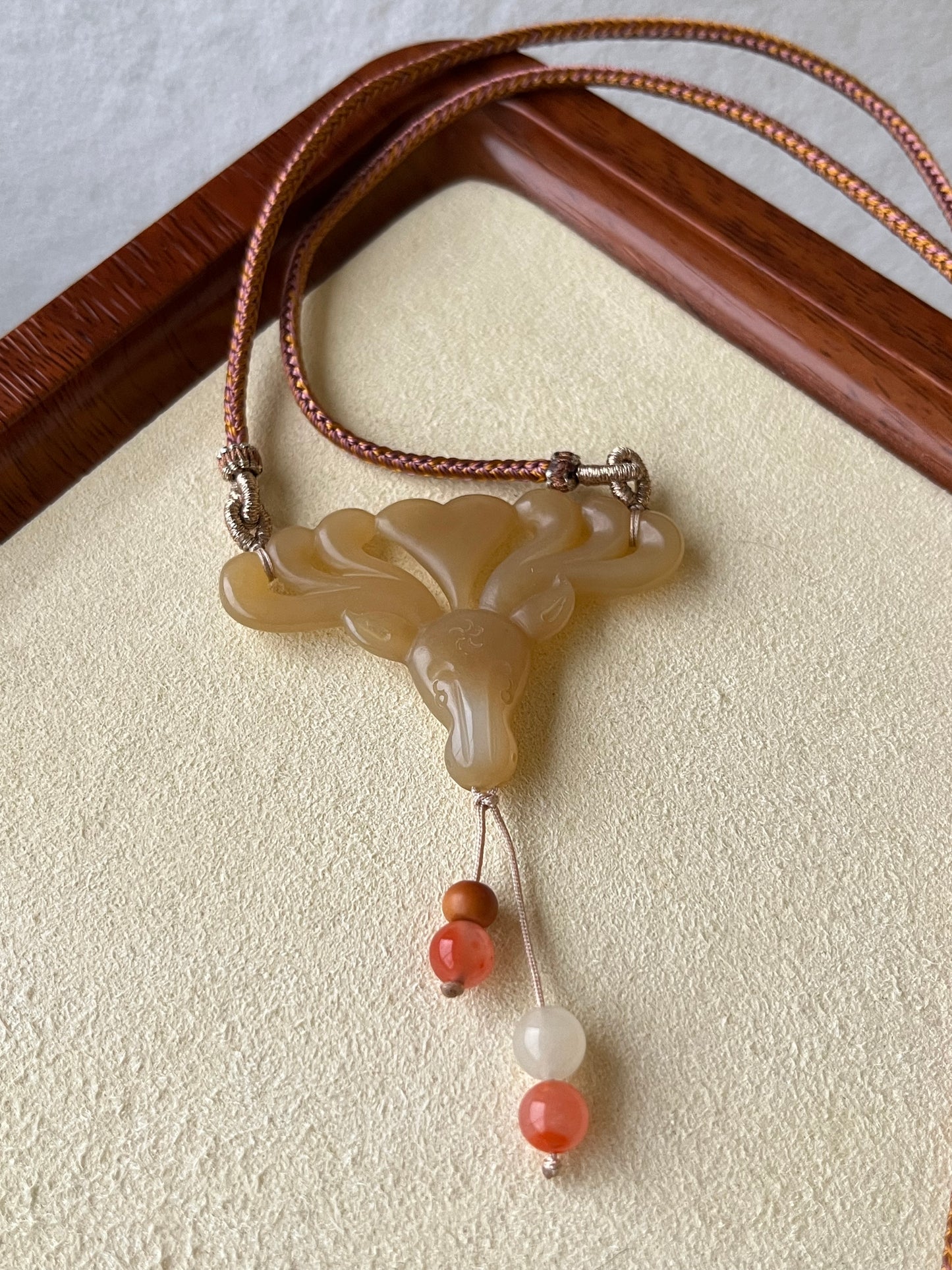 Hand Carved Brown And White Hetian Jade Deer Pendant | 手雕和田糖白梅花鹿