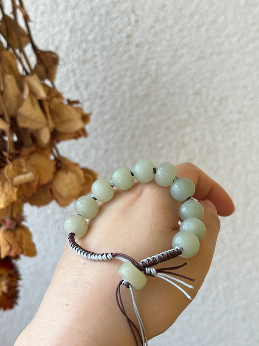 Hand-woven Bracelet with Hand Crafted Hetian Jade Beads (11mm x 9mm), 手编和田玉且末手工老光珠手绳