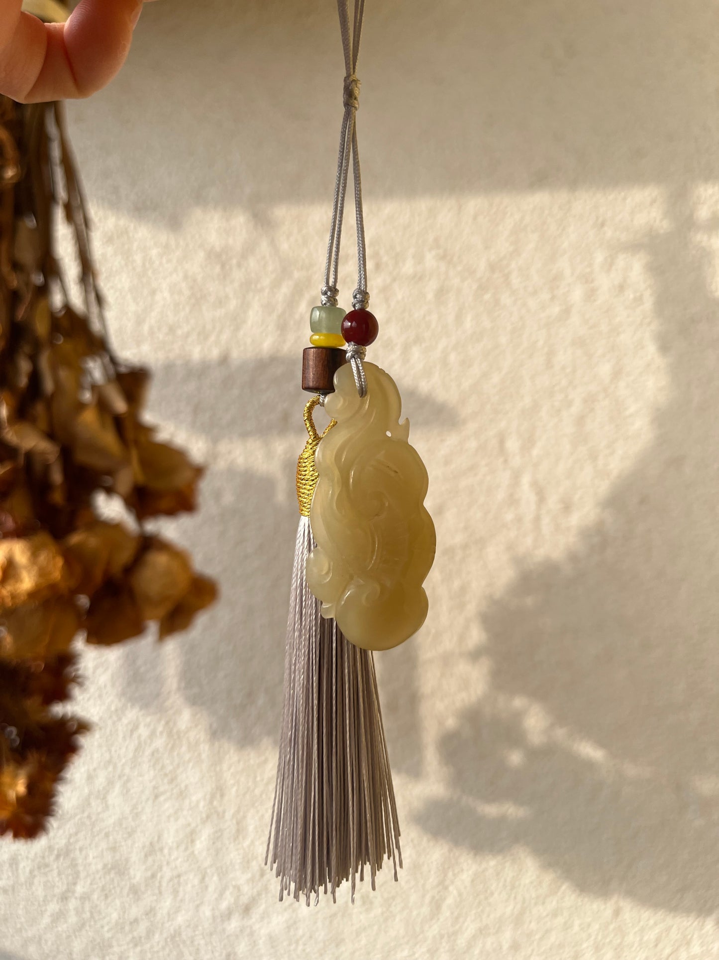 Hand Carved Hetian Jade Ruyi Bag Charm | 手雕和田如意包挂