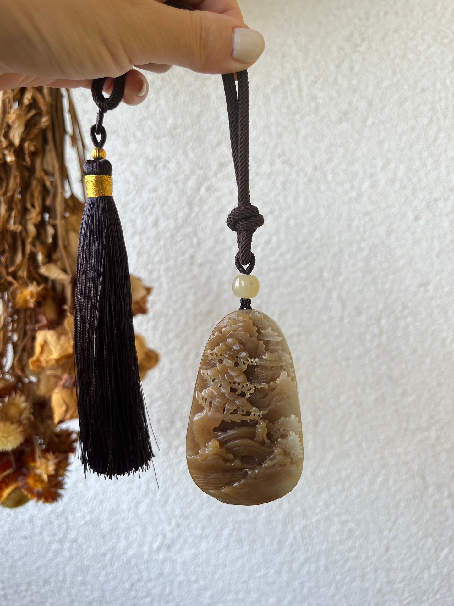 Hand Carved Brown and White Hetian Jade Landscape Pendant | 手雕糖白和田玉山水手把件