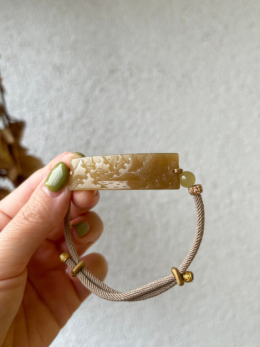 Bracelet Crafted from a Hand Carved Brown Hetian Jade Landscape Pendant | 手雕和田浅糖山水手牌