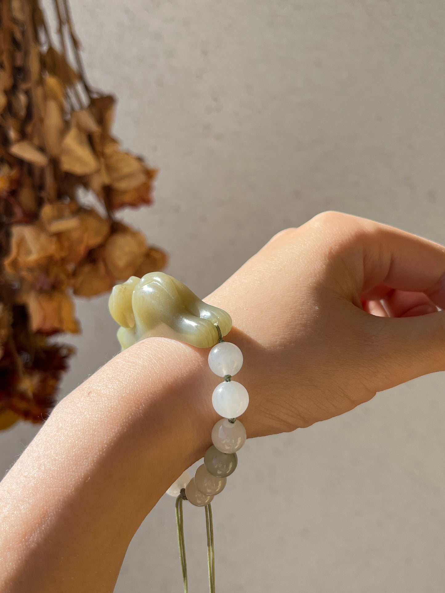 Handwoven Bracelet with a Hand Carved Nephrite Jade Lucky Cat Pendant, 手编和田可爱趴趴招财猫手牌