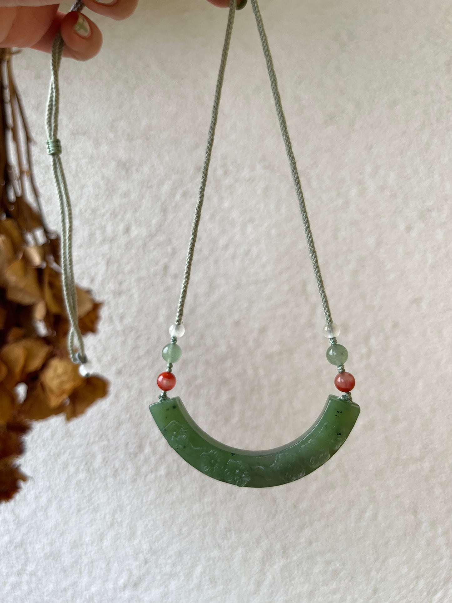 Hand Carved Green Hetian Jade Plum Blossom Arc-shaped Huang Pendant | 手雕碧玉梅花玉璜