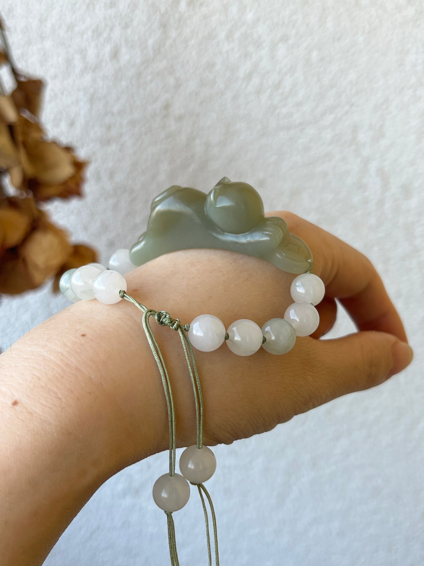 Handwoven Bracelet with a Hand Carved Nephrite Jade Lucky Cat Pendant, 手编和田可爱趴趴招财猫手牌