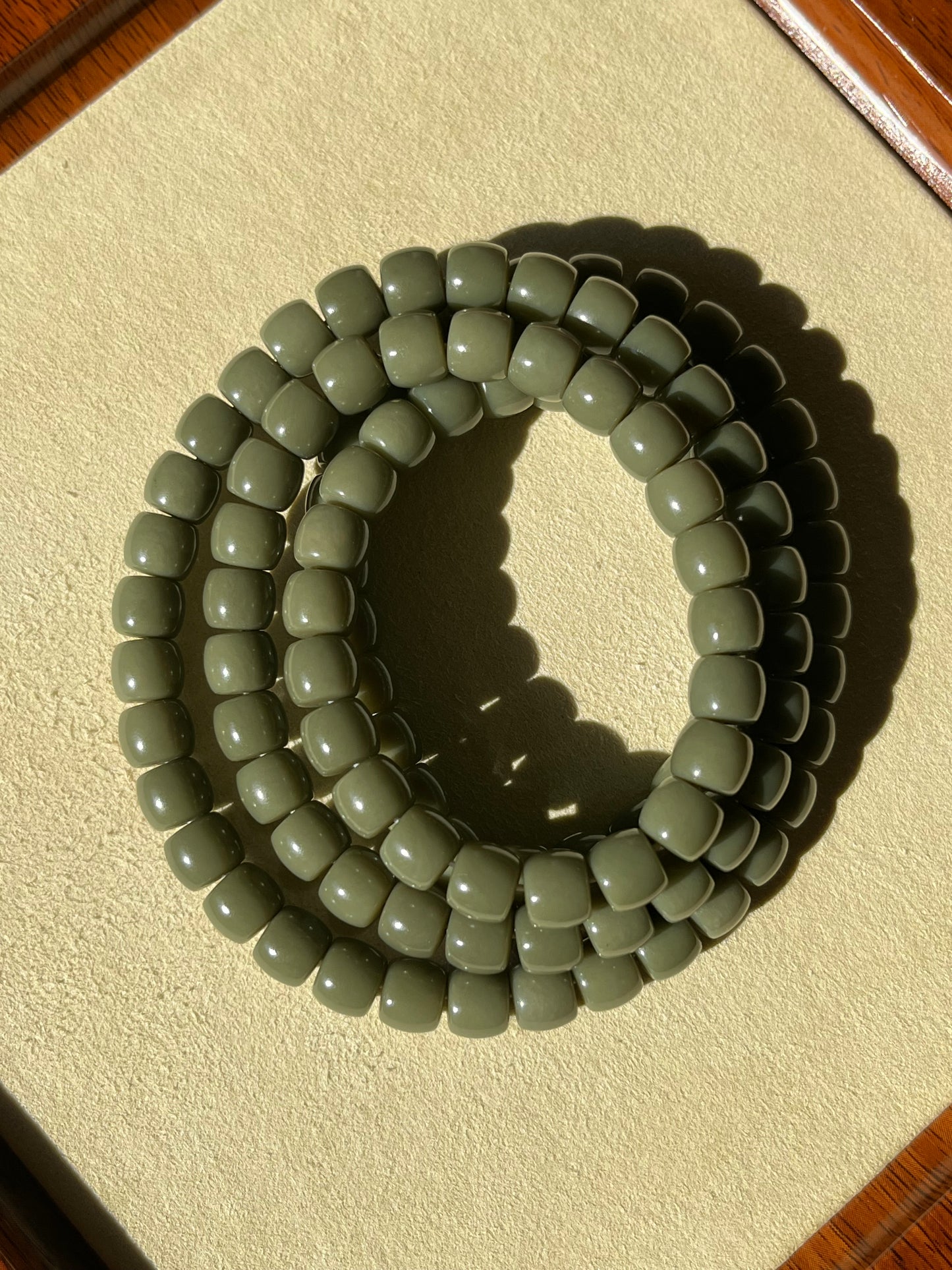 Straight Cut Elaeagnus Green Hetian Jade Beaded Bracelet (8mm x 6mm) | 和田沙枣青直切手串