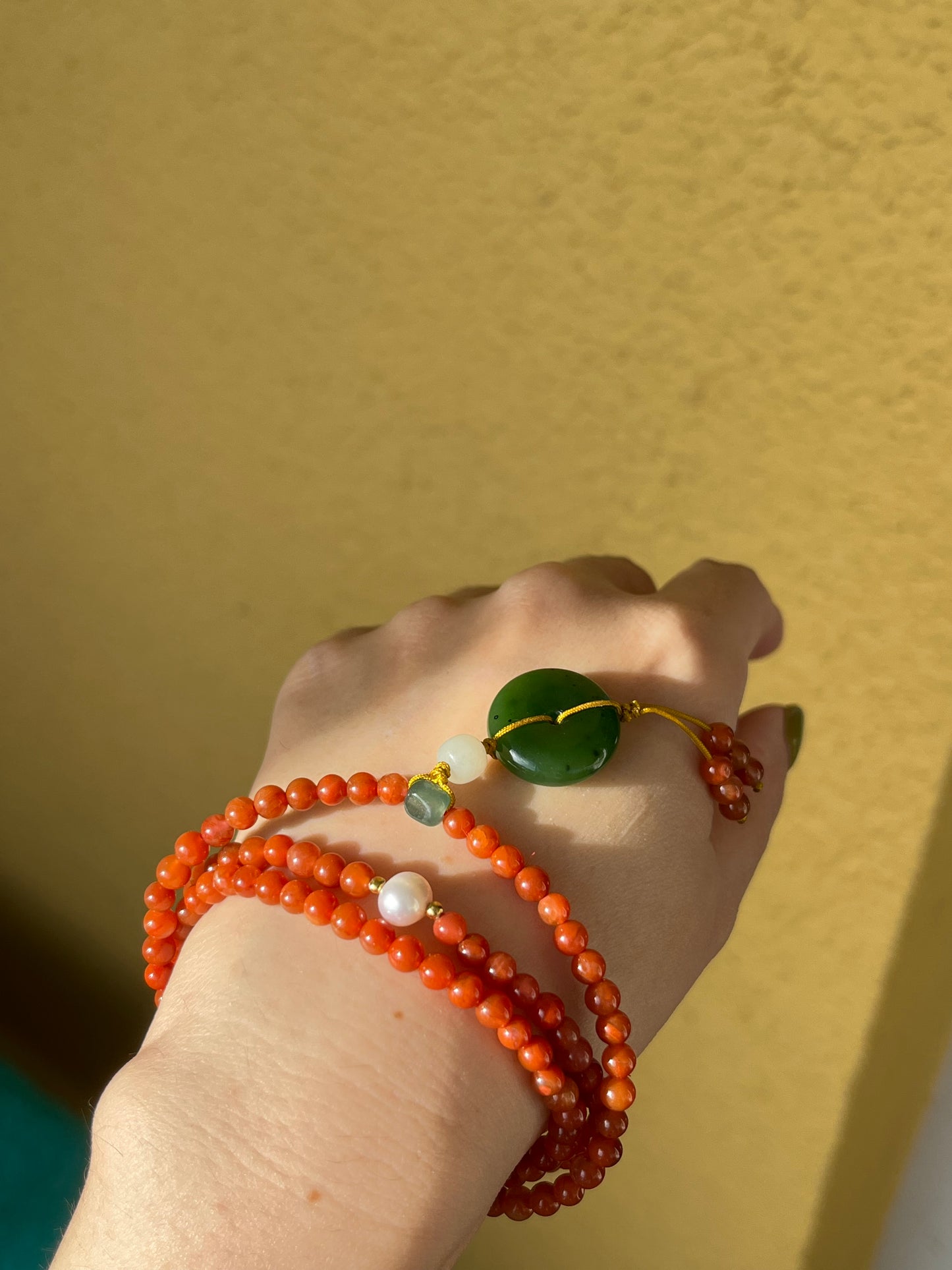 Multi-Function Three Loop Southern Red Agate Beaded Bracelet with a Green Hetian Jade PI pendant (ping an kou), 南红多圈手串加碧玉平安扣