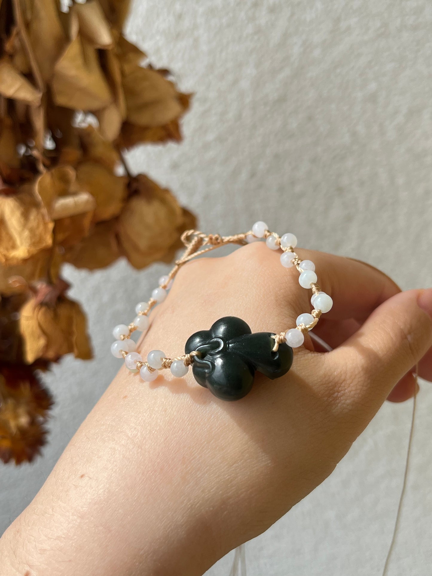 Handmade Bracelet with a Dark Cyan Hetian Jade Lotus | 手编和田青玉一细小荷花手牌