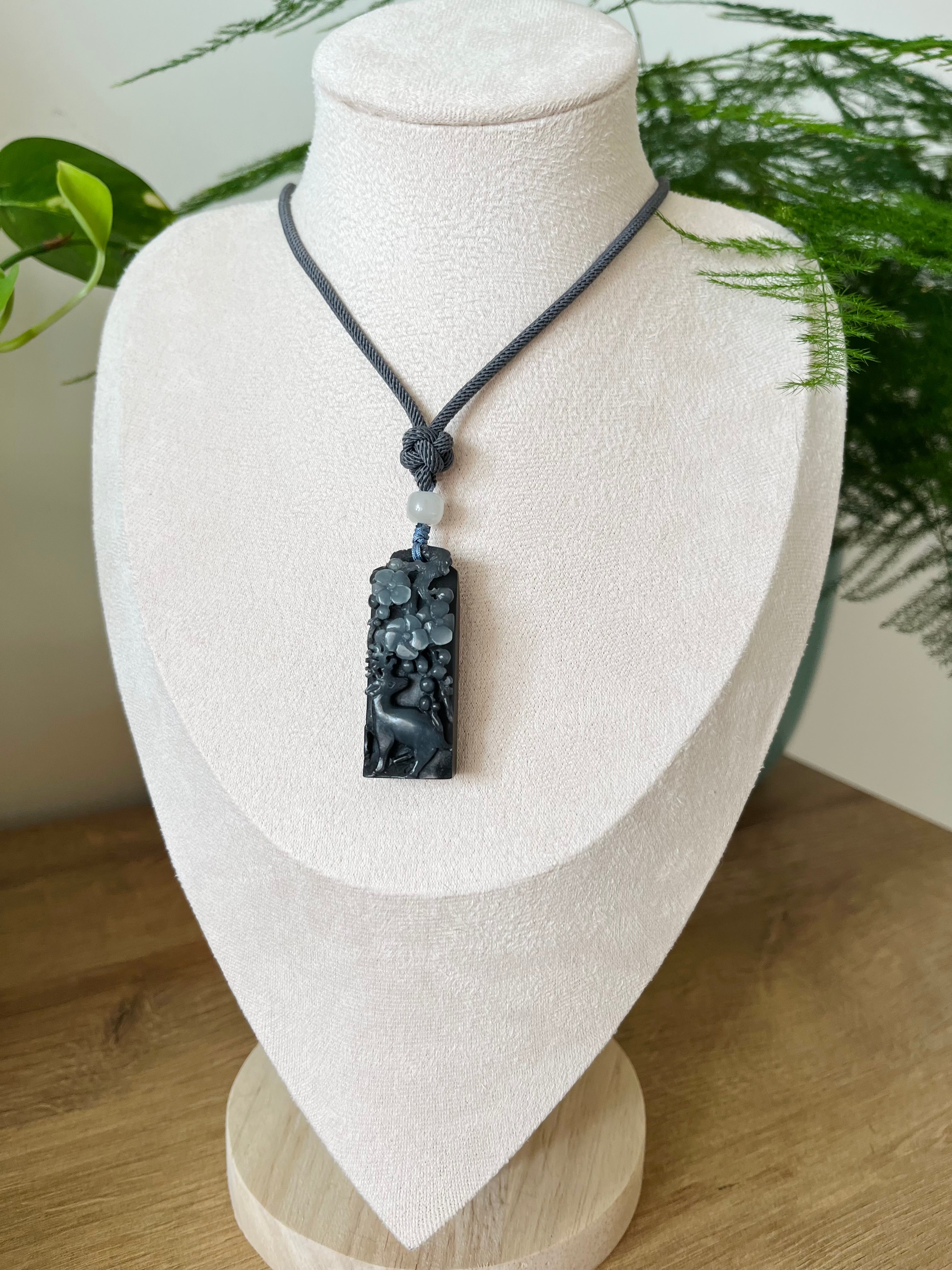 Hand Carved Black Hetian Jade Deer and Plum Blossoms, 手雕青花籽料