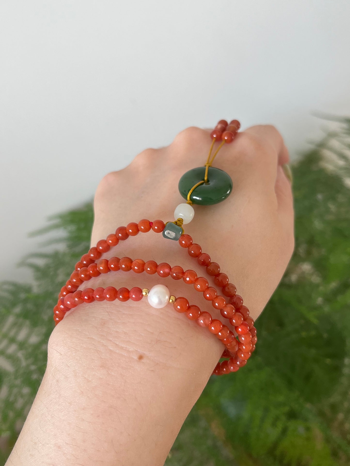 Multi-Function Three Loop Southern Red Agate Beaded Bracelet with a Green Hetian Jade PI pendant (ping an kou), 南红多圈手串加碧玉平安扣