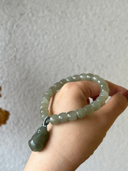 Straight Cut Hetian Jade Beaded (7mm x 8mm) Bracelet with a Hetian Jade Pixiu Pendant