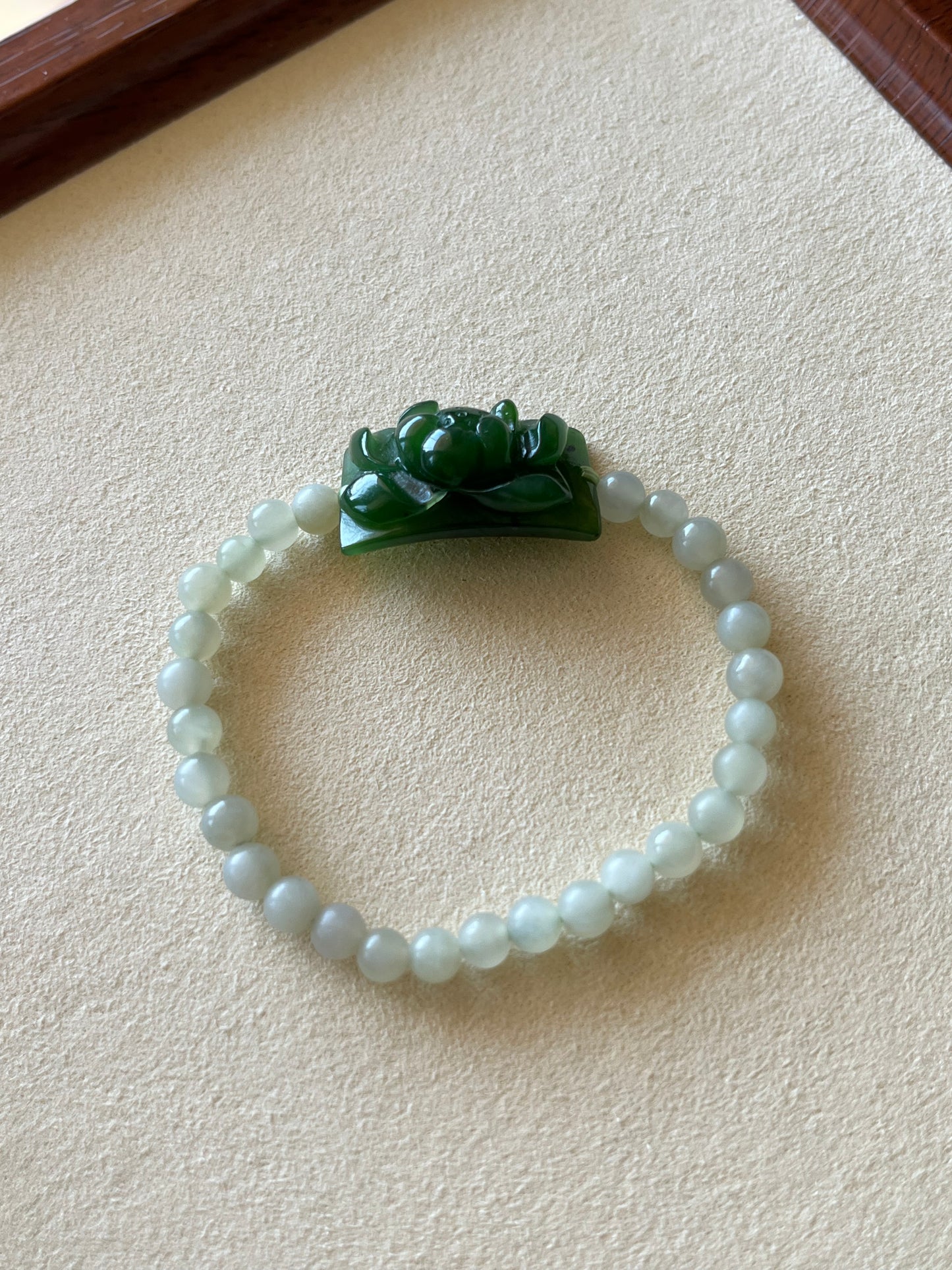 Bracelet Crafted from a Hand Carved Green Hetian Jade Lotus Pendant | 手雕碧玉小荷花手牌