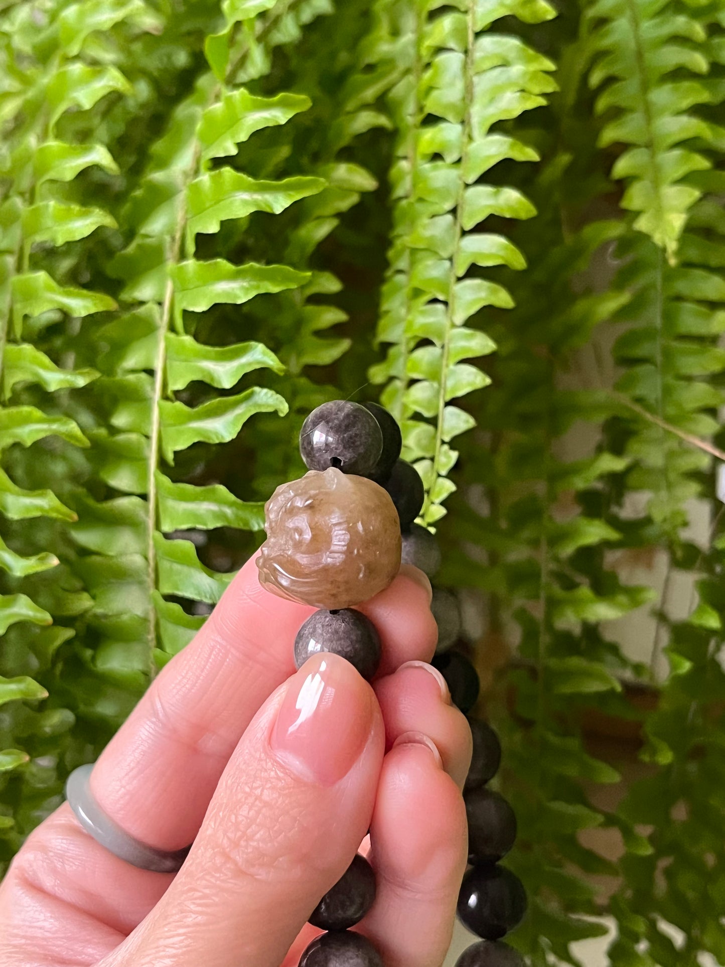 11mm Obsidian Beaded Bracelet with a Brown Hetian Jade Lion Dance Head