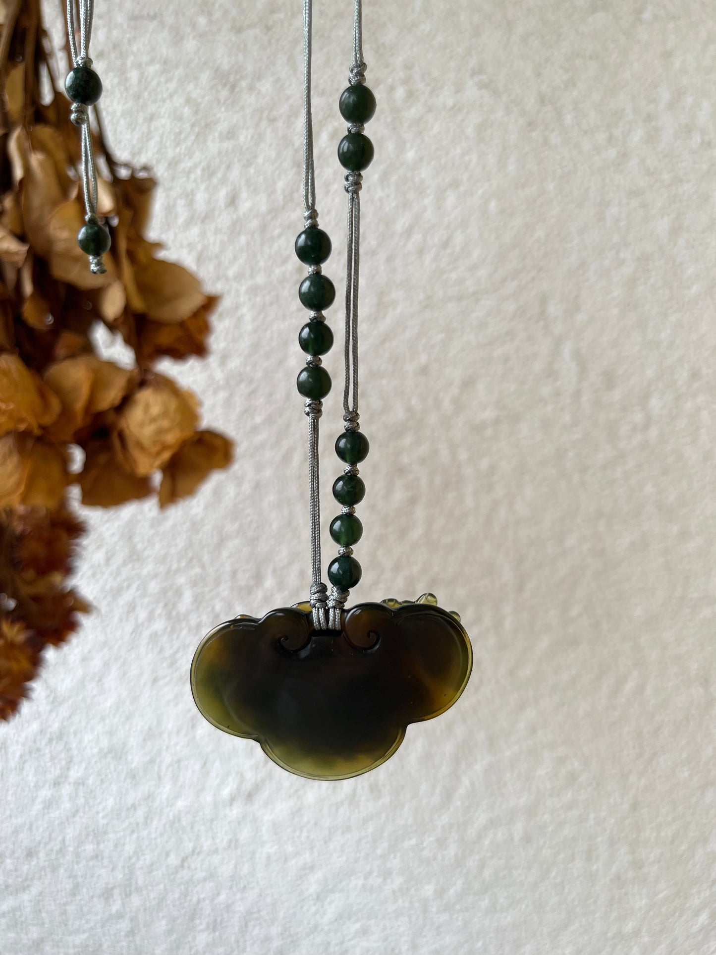 Hand Carved Tea Green Xiu Jade Peony and Butterfly Ruyi Pendant