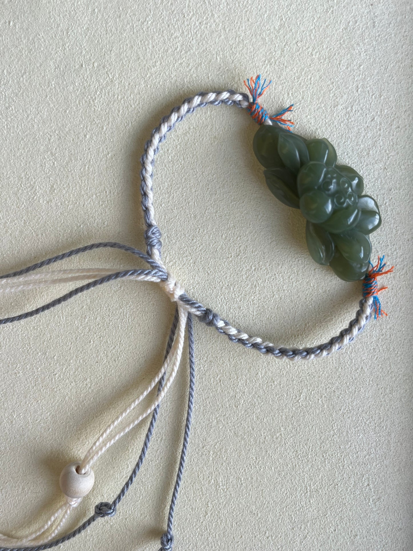Handmade Bracelet with a Hand Carved Green Hetian Jade Lotus Pendant