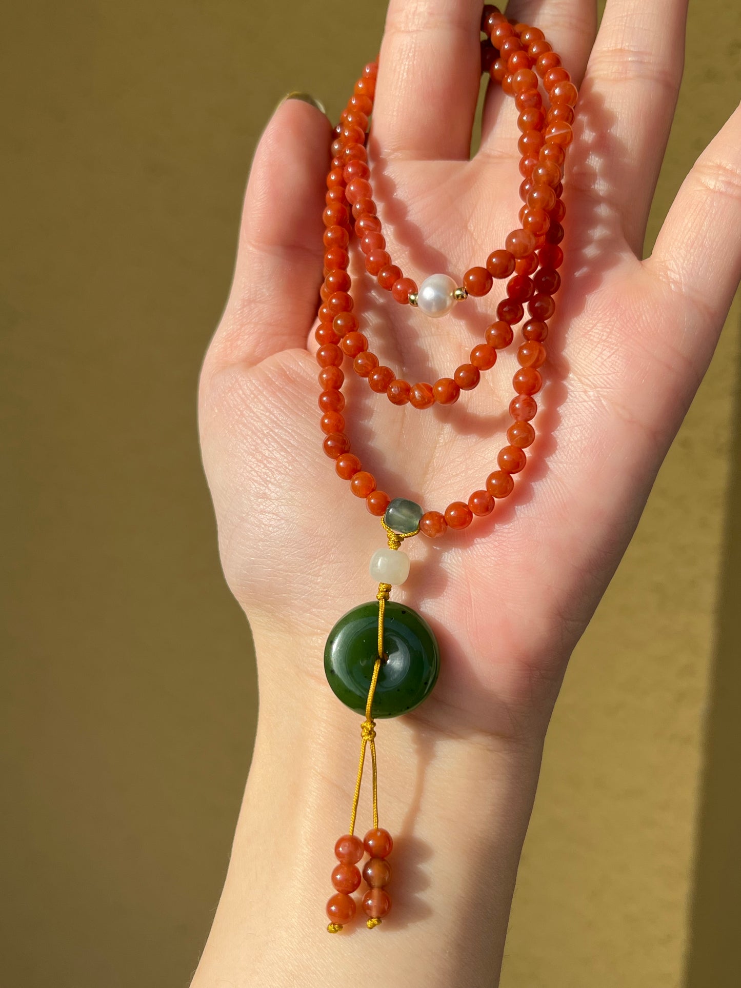 Multi-Function Three Loop Southern Red Agate Beaded Bracelet with a Green Hetian Jade PI pendant (ping an kou), 南红多圈手串加碧玉平安扣