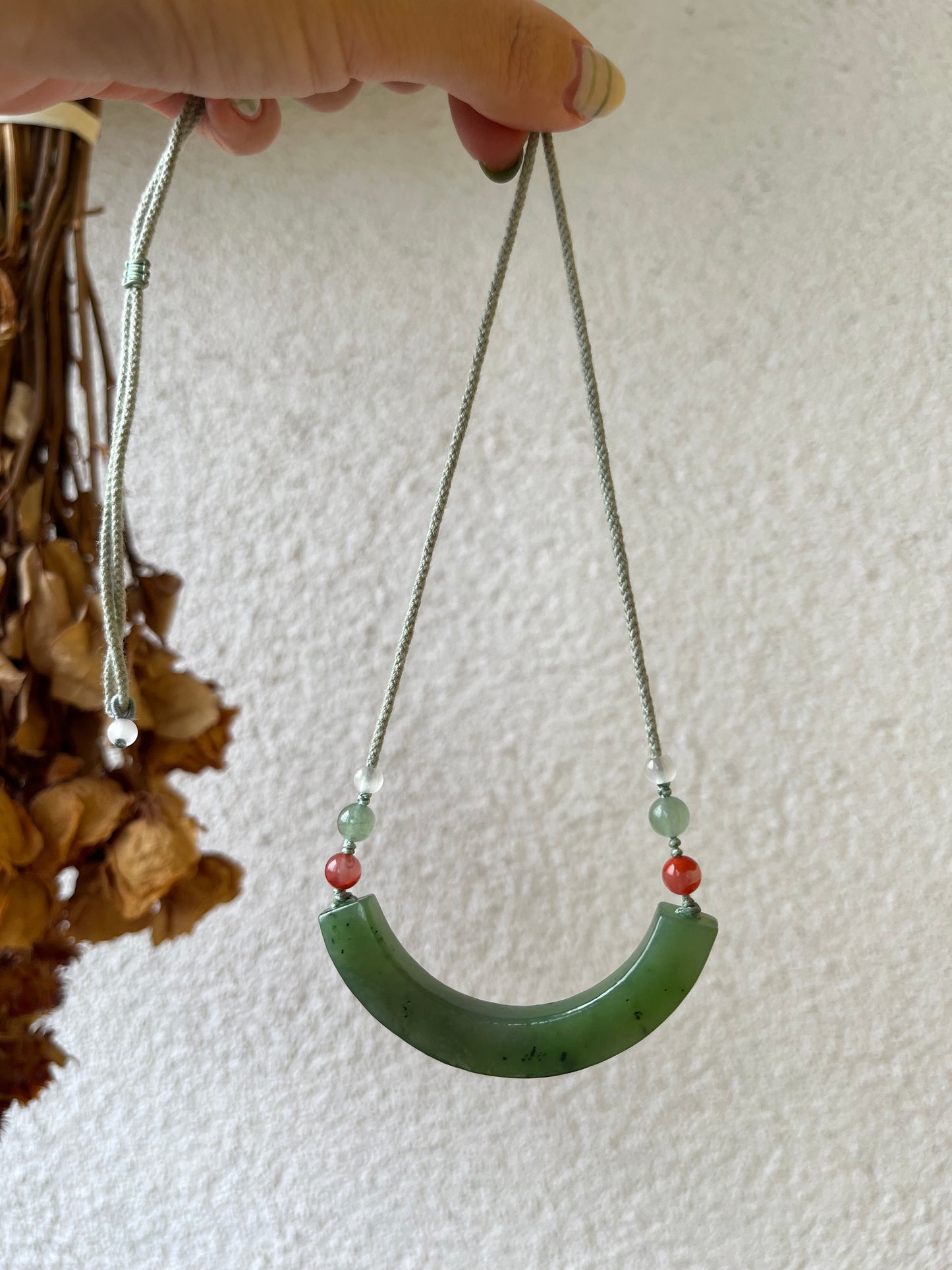 Hand Carved Green Hetian Jade Plum Blossom Arc-shaped Huang Pendant | 手雕碧玉梅花玉璜