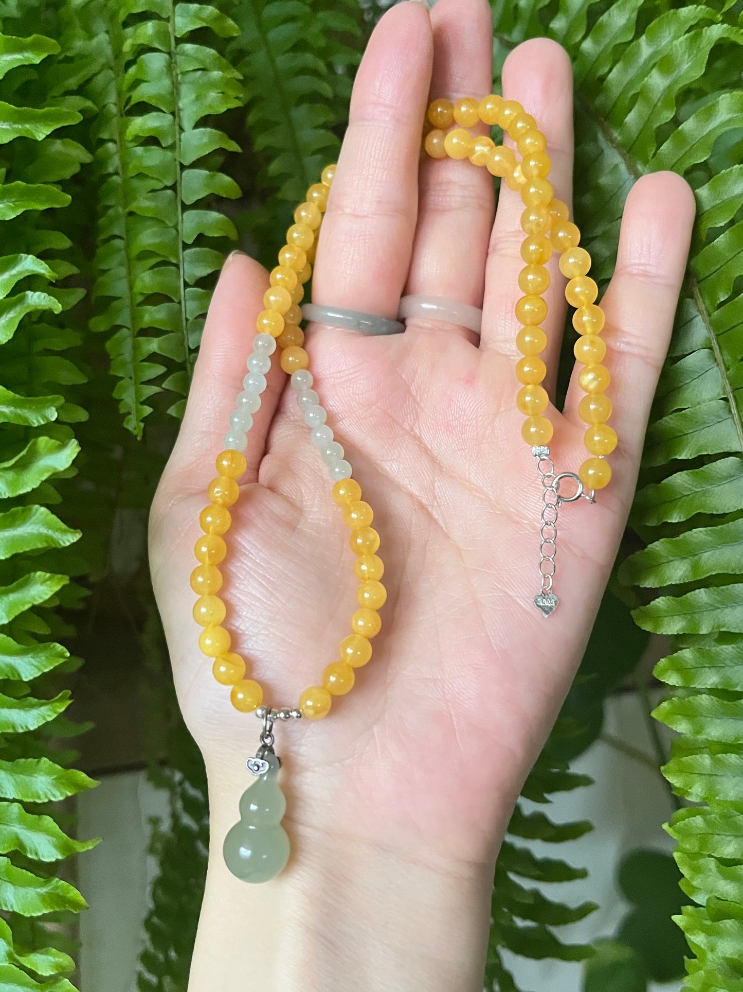 Necklace Crafted from 5mm Amber Beads and 4mm Hetian Jade Beads with a Hetian Jade Hulu Pendant