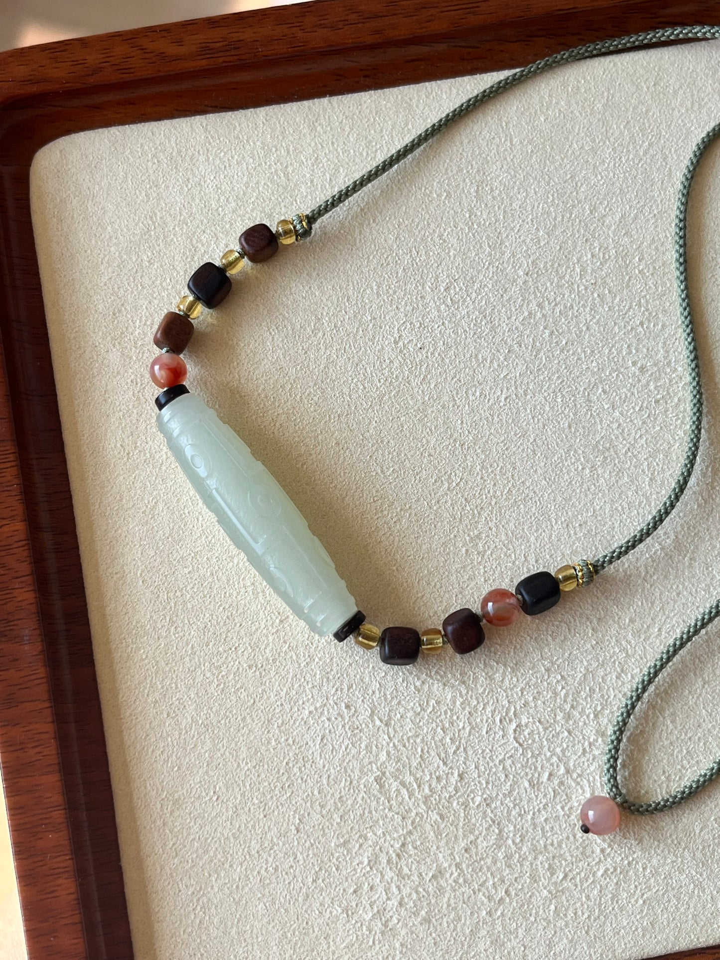 Necklace Crafted from a Hetian Jade Nine-Eyed Dzi Bead | 和田晴水九眼天珠