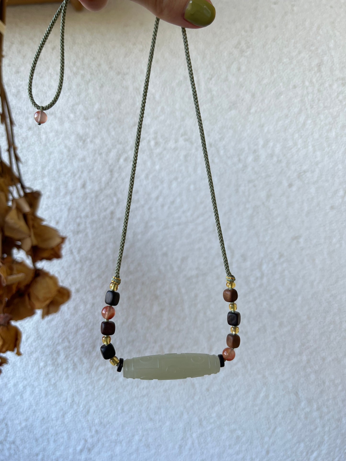 Necklace Crafted from a Hetian Jade Nine-Eyed Dzi Bead | 和田晴水九眼天珠